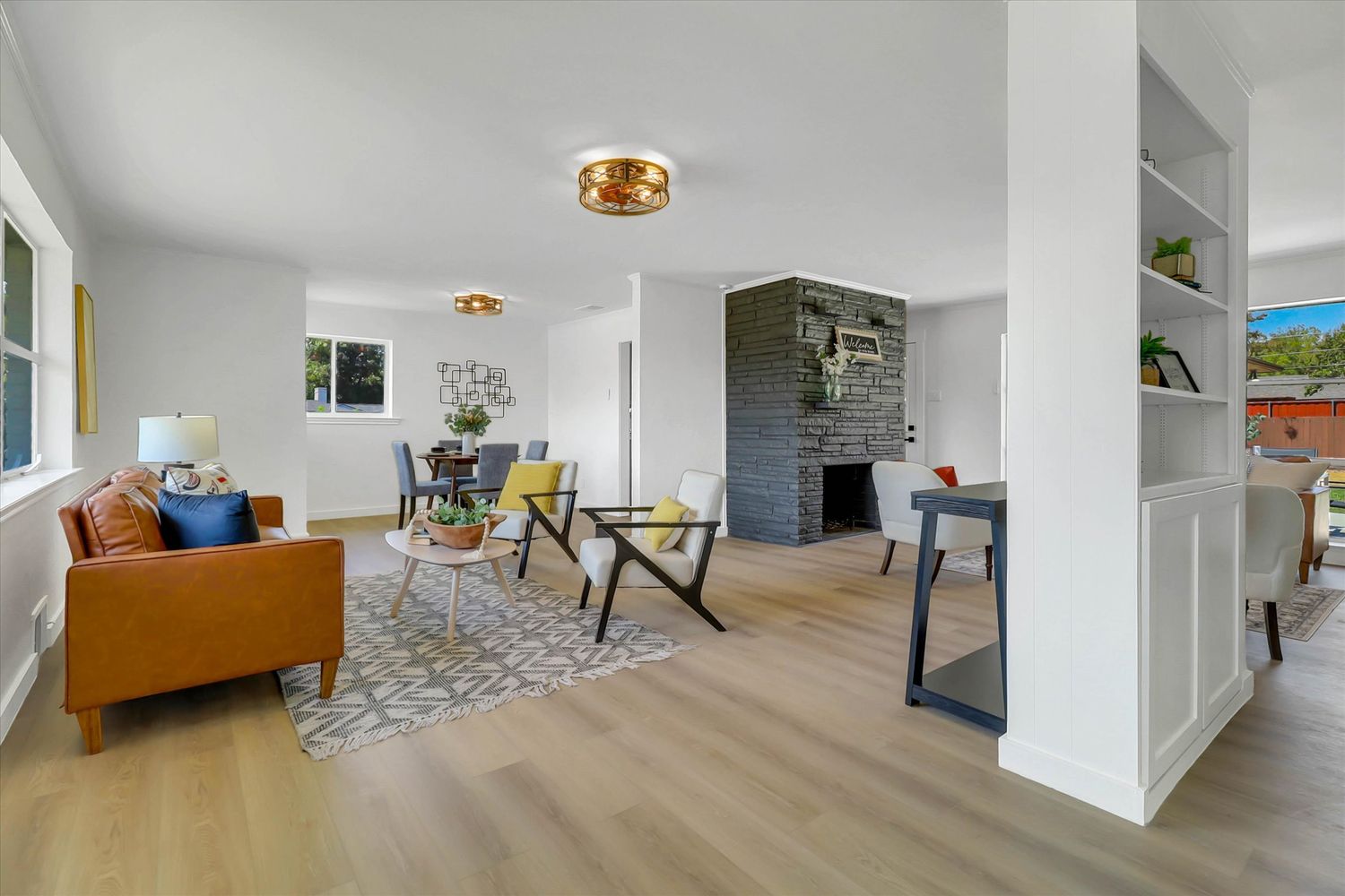 Living, dining, and a third seating area, all open to each other